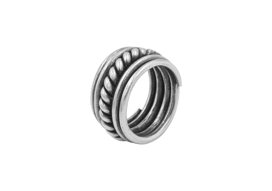 Twisted silver band ring from Hill to Street over a white background